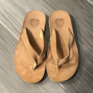 Tan Leather Flip Flop Sandals - Pinecone Logo